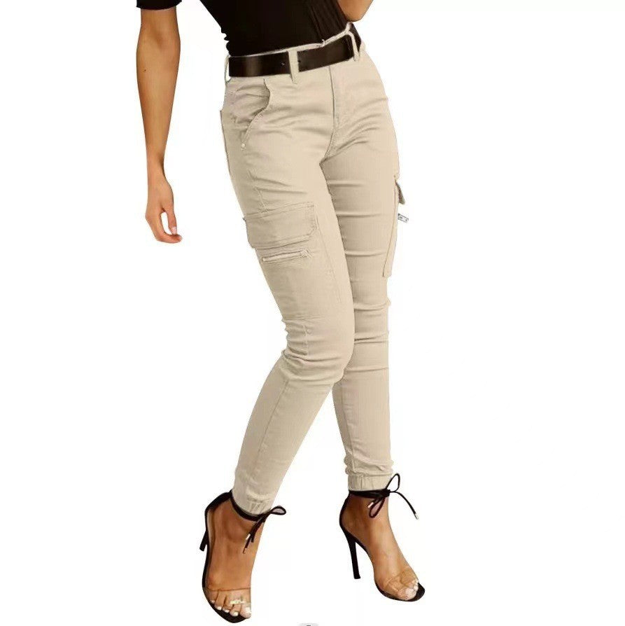 Pantalon taille basse à poches boutonnées de couleur unie pour femme